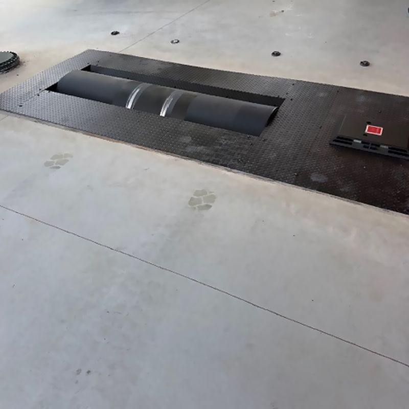 The dyno rollers set flush into the shop floor
